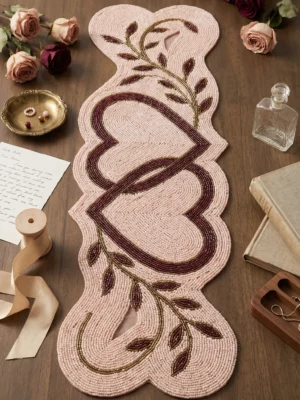 Blush Pink Interlocking Heart Hand Beaded Table Runner Blush pink hand beaded table runner with interlocking burgundy hearts and botanical vines