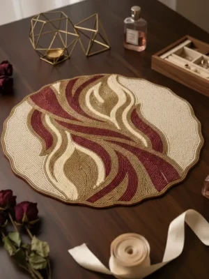 Burgundy & Gold Abstract Hand Beaded Placemat Burgundy and gold abstract hand beaded placemat with ivory beadwork