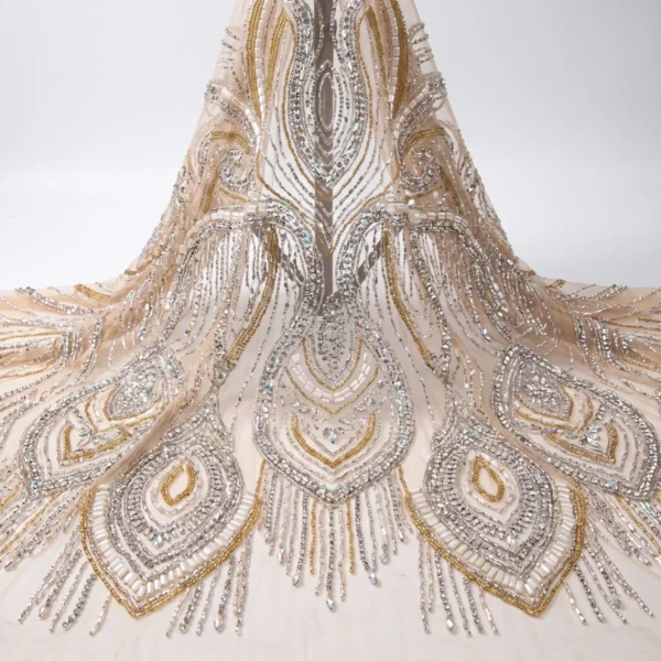 Gold & Silver Crystal Couture Beaded Fabric Ivory couture beaded fabric with gold and silver crystals, beads and large symmetrical statement motifs.