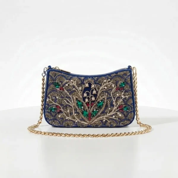 Navy Blue Hand Beaded Crossbody Bag with Chain Strap Navy blue hand beaded crossbody bag with green embellishments and gold chain strap