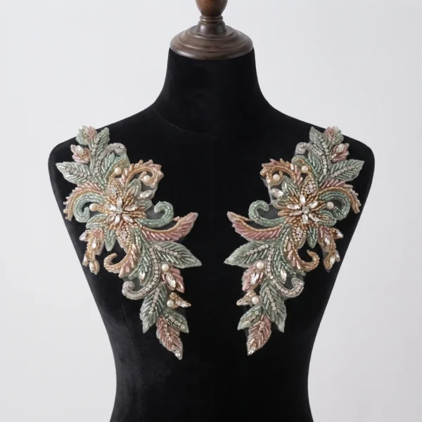 Pastel Floral Hand Beaded Applique Pair Pastel floral hand beaded applique pair with pearls, crystals and intricate leaf embroidery for dresses and couture garments.