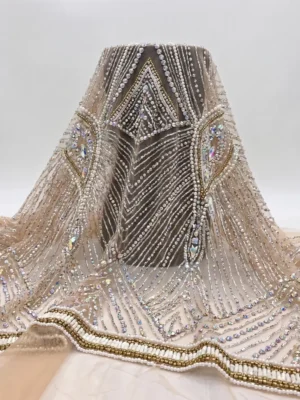 Pearl & Crystal Geometric Couture Beaded Fabric Nude couture beaded fabric with pearls, iridescent crystals and geometric hand embellished patterns.