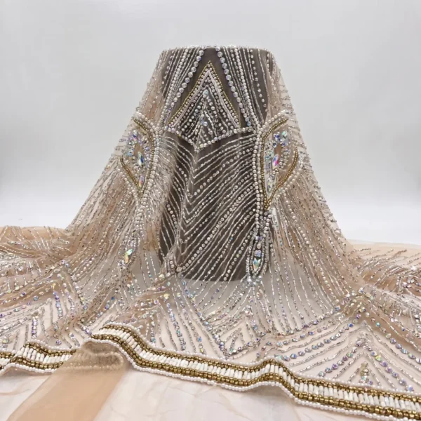 Pearl & Crystal Geometric Couture Beaded Fabric Nude couture beaded fabric with pearls, iridescent crystals and geometric hand embellished patterns.