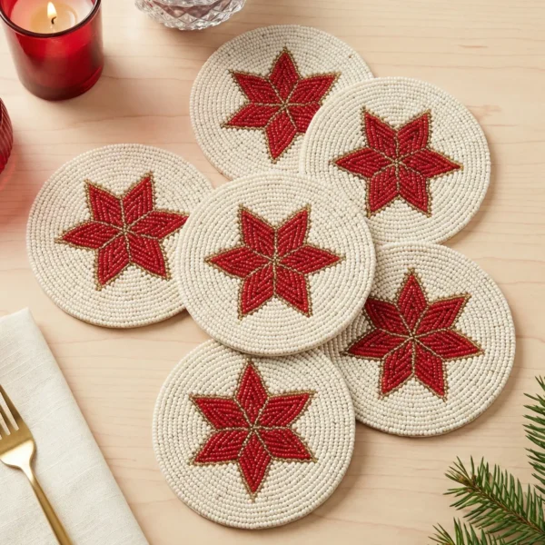 Red and ivory Christmas hand beaded coasters with six-point star design
