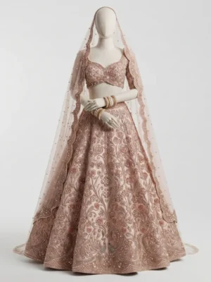 Rose Gold Floral Hand Beaded Bridal Lehenga Rose Gold Floral Hand Beaded Bridal Lehenga with Pearl & Sequin Embellishments
