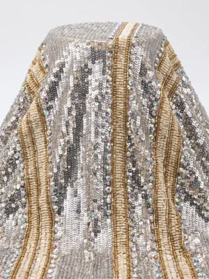 Silver Wave Sequin Beaded Fabric Silver sequin beaded fabric with flowing ivory bugle bead panels, gold bead outlines and iridescent crystal accents.