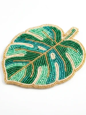 Tropical Monstera Leaf Hand Beaded Patch Tropical monstera leaf hand beaded patch with green, turquoise, mint and ivory seed beads finished with metallic gold bead detailing.
